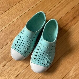 Natives teal Jeffersons